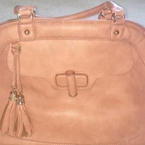 Looking for this bag in black.